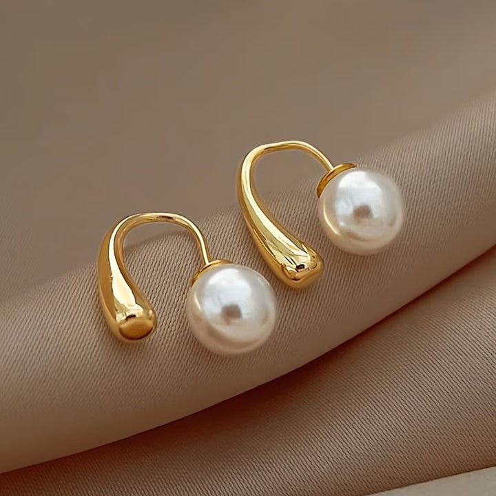 Orecchini Minimalisti con Perla ad Arco