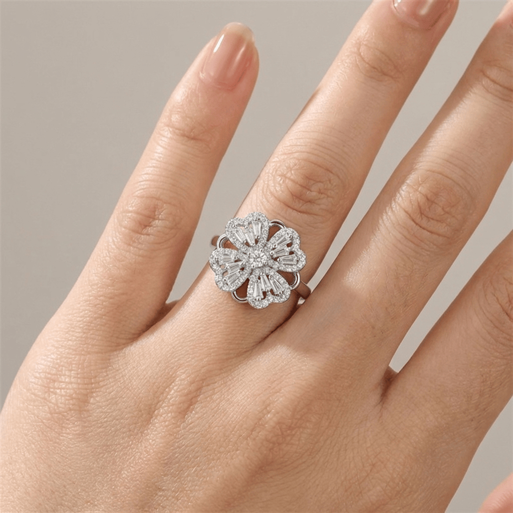 ANELLO A FIORE ROTANTE IN ZIRCONIA BAGUETTE - (REGOLABILE)