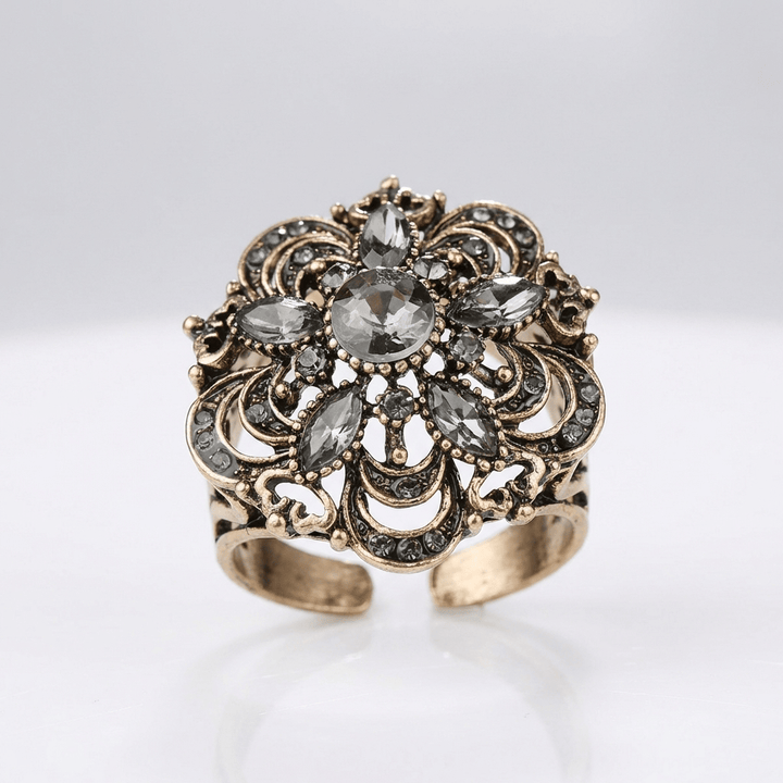 ANELLO A FIORI CON DIAMANTI ARGENTATI