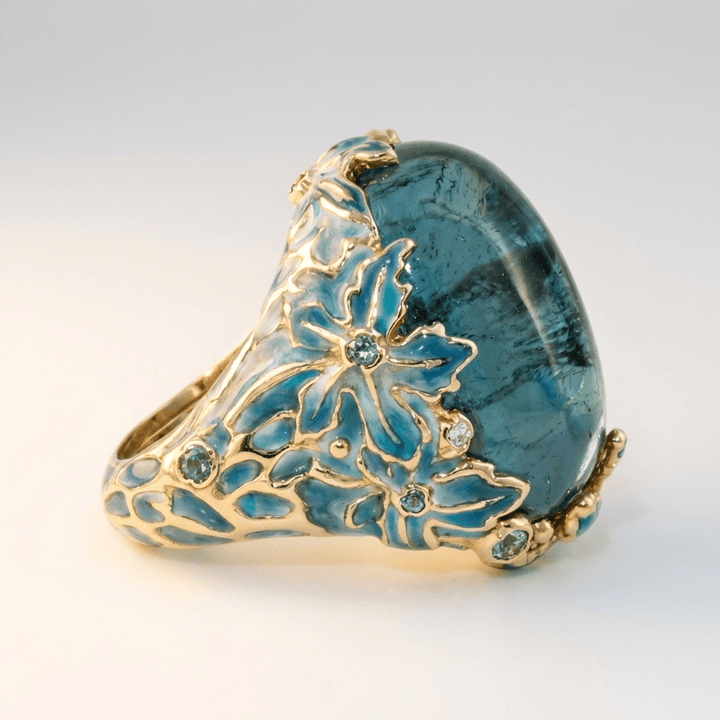 ANELLO A FIORE IN APATITE BLU ORO