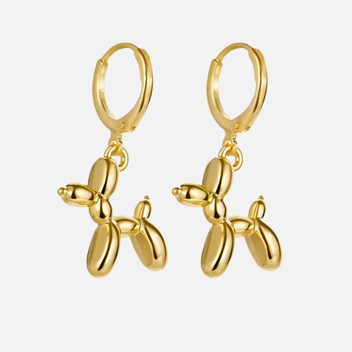 Orecchini Huggie color oro con Charm Mini Cagnolino