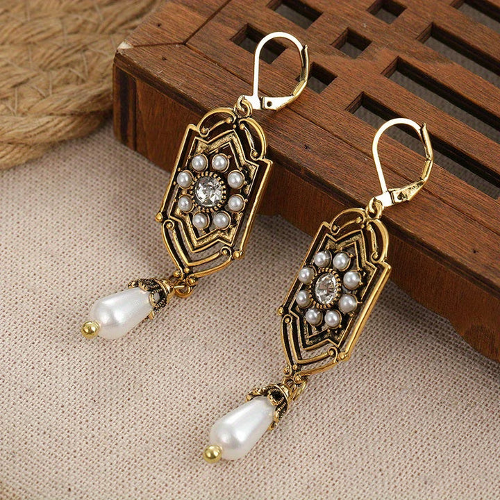 Orecchini Vintage in Perla Incastonata d'Oro