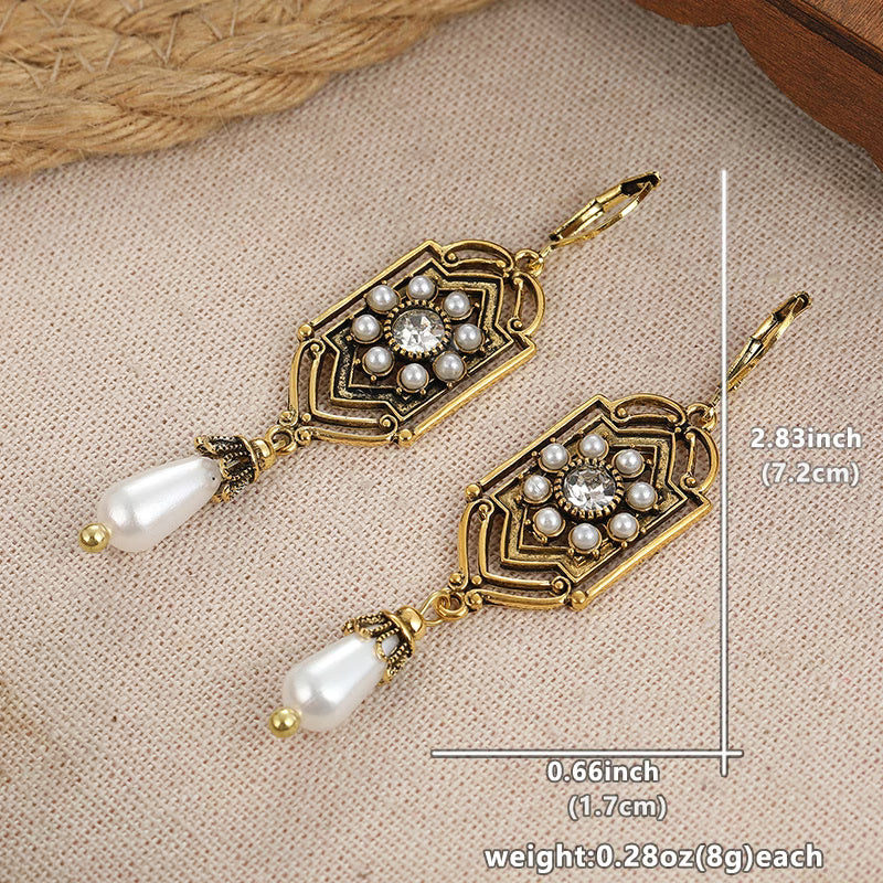 Orecchini Vintage in Perla Incastonata d'Oro