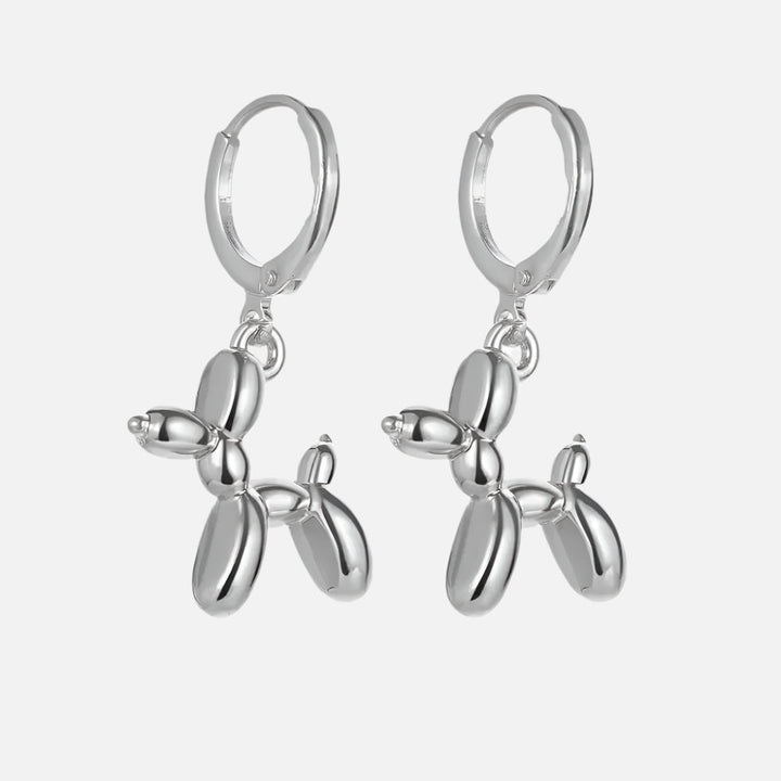 Orecchini Huggie color oro con Charm Mini Cagnolino