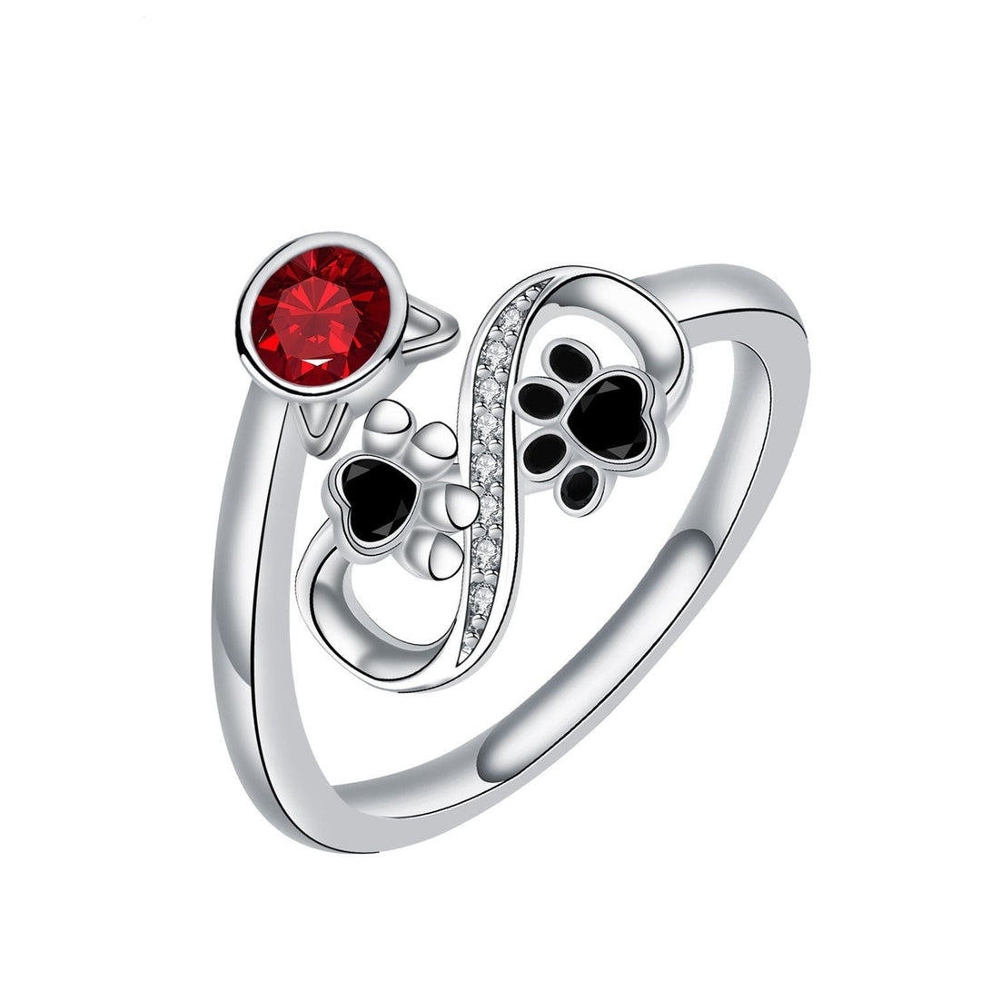 Anello Regolabile con Impronta Nera e Gemma Rossa