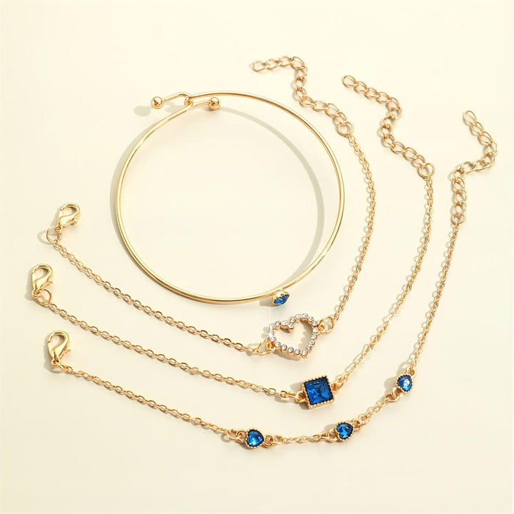 Set di Bracciali Cuori Dorati in Pietra Blu