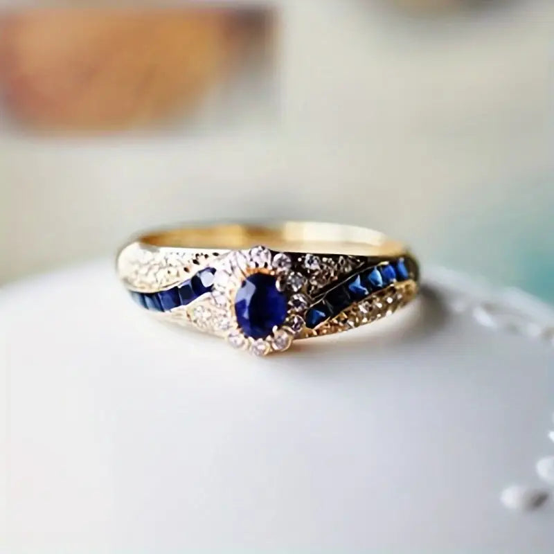 Anello color oro La Regina