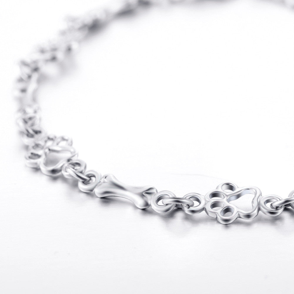 Braccialetto color argento Puro Edizione Limitata con Charm a Forma di Zampa e Osso di Cane