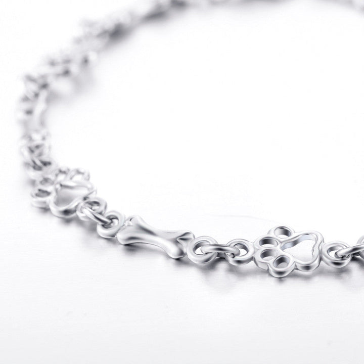 Braccialetto color argento Puro Edizione Limitata con Charm a Forma di Zampa e Osso di Cane