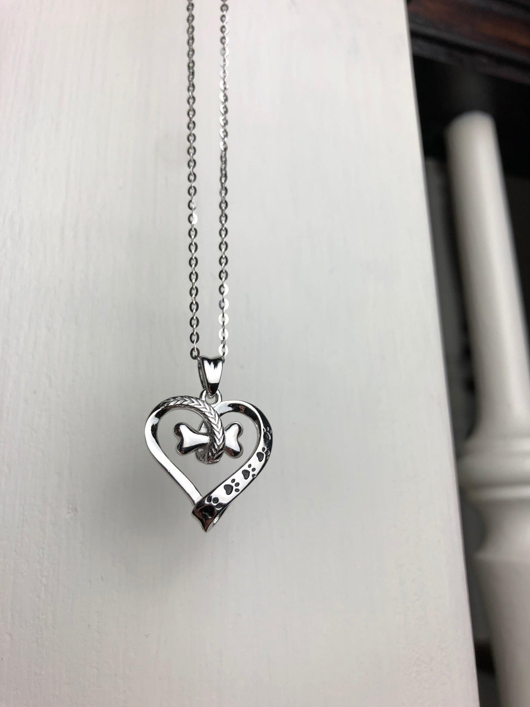 Collana con Zampa di Cane e Cuore in Acciaio Inossidabile