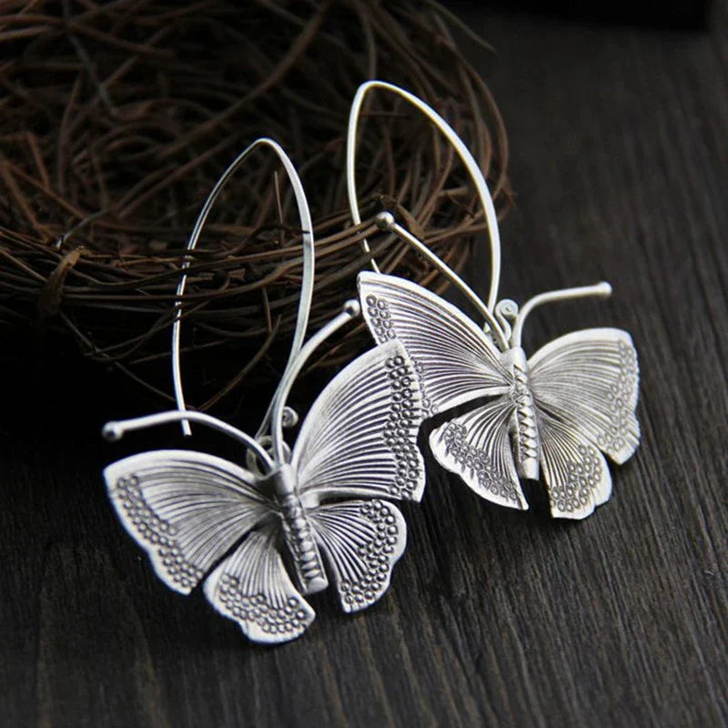 Orecchini a Farfalla color argento Vintage