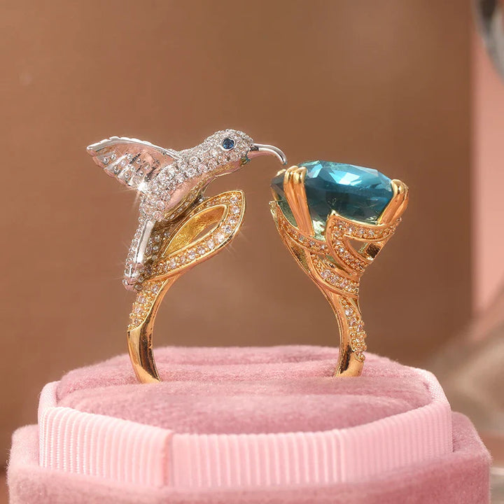 Anello Regolabile Colore Acquamarina con Colibrì – Placcato Oro