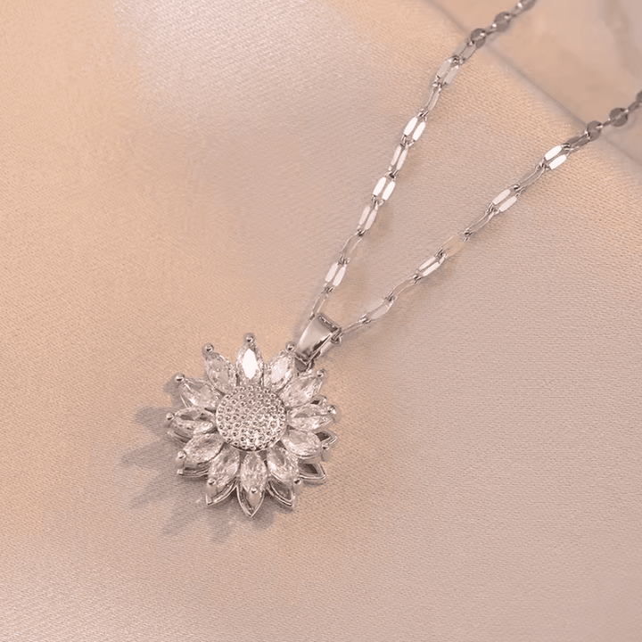 Set di collana e orecchini in zirconia color argento a forma di girasole