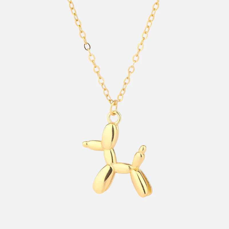 Collana con pendente a forma di cane palloncino in tonalità oro