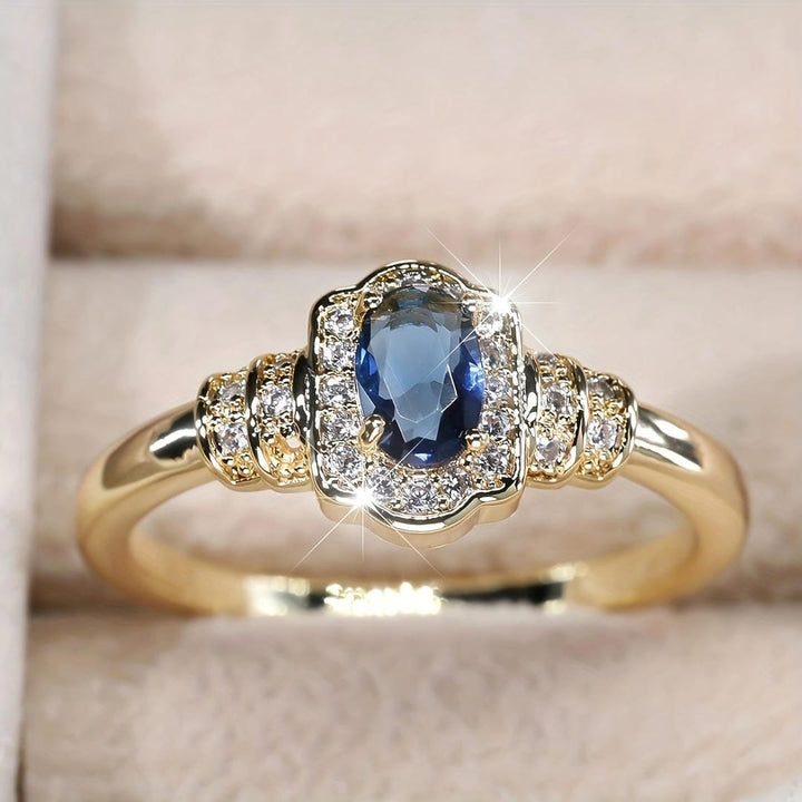 Anello in Cristallo con Halo di Pietra Blu Eredità