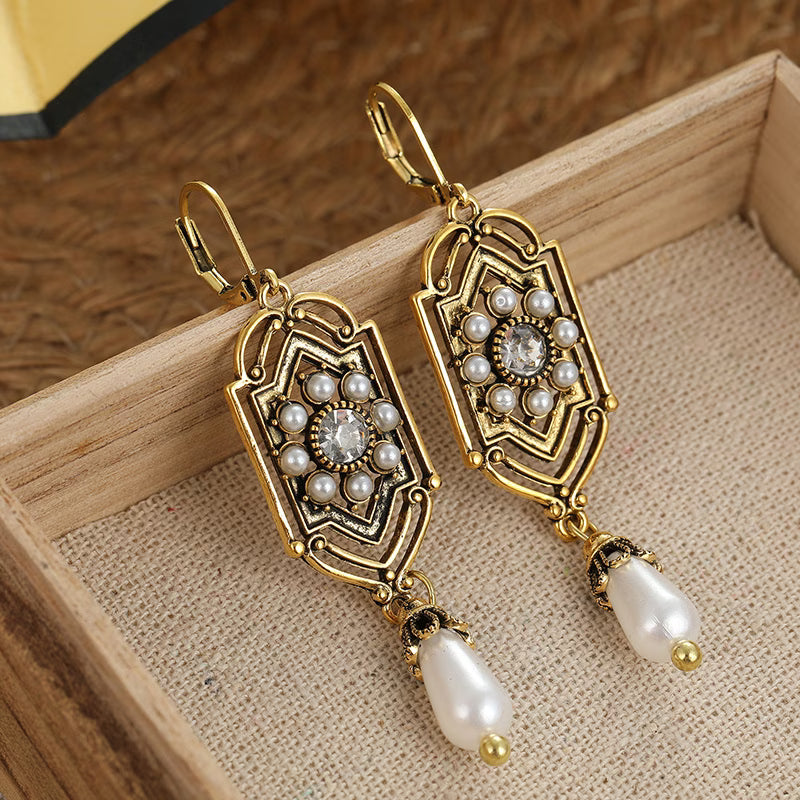 Orecchini Vintage in Perla Incastonata d'Oro