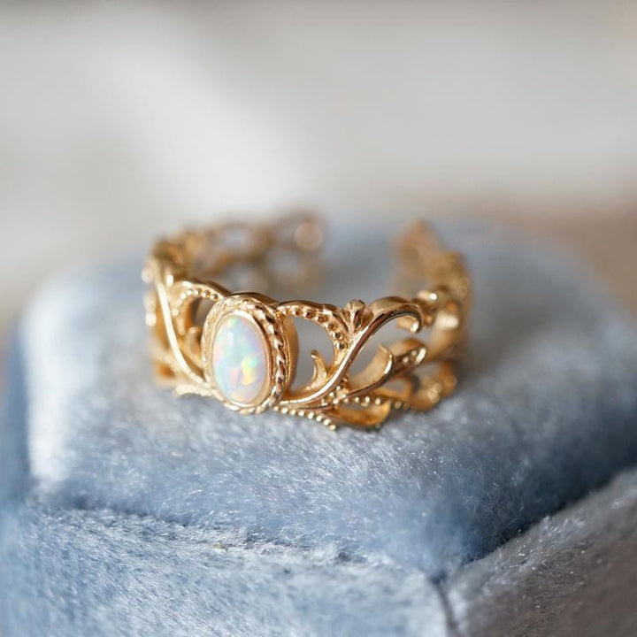 ANELLO CON ALI CELESTIALI IN OPALLO ROSA - (REGOLABILE)