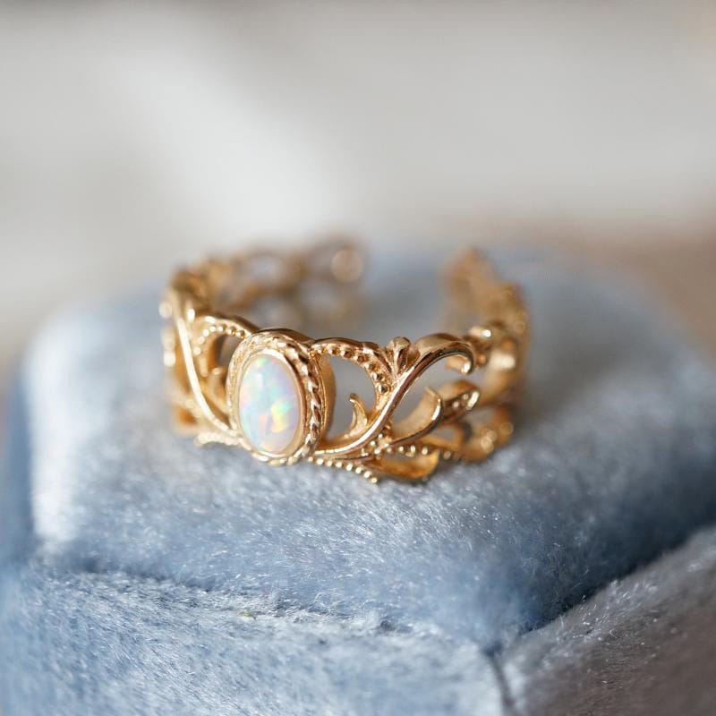ANELLO CON ALI CELESTIALI IN OPALLO ROSA - (REGOLABILE)