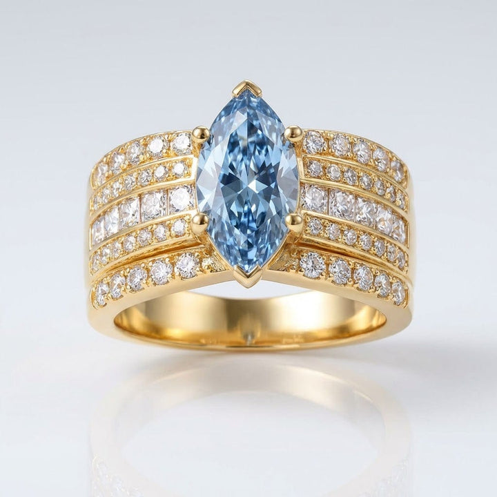 ANELLO color oro CON CRISTALLO BLU MARQUIS A LARGA FASCIA