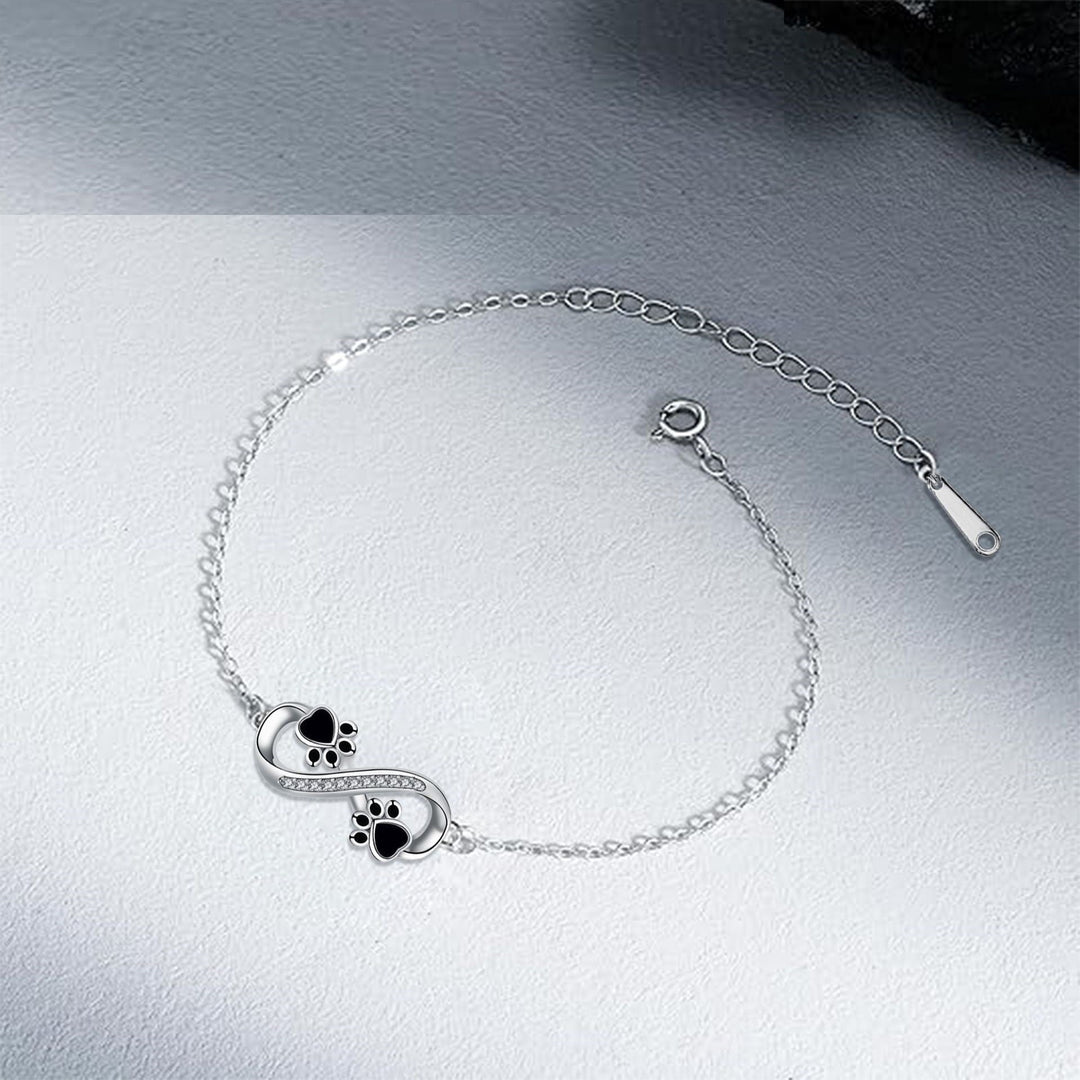 Bracciale con Pendente Simbolo Infinito e Zampe di Animale con Zirconia