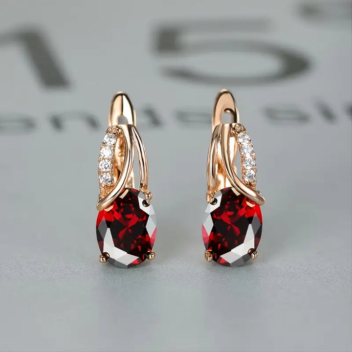 Orecchini a Goccia Twist color oro e Pietra Rossa