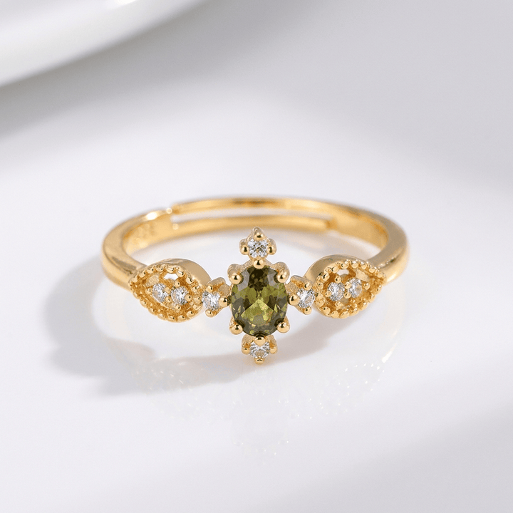 ANELLO D'ORO D'AFFETTO CON CRISTALLO VERDE OLIVA - (REGOLABILE)