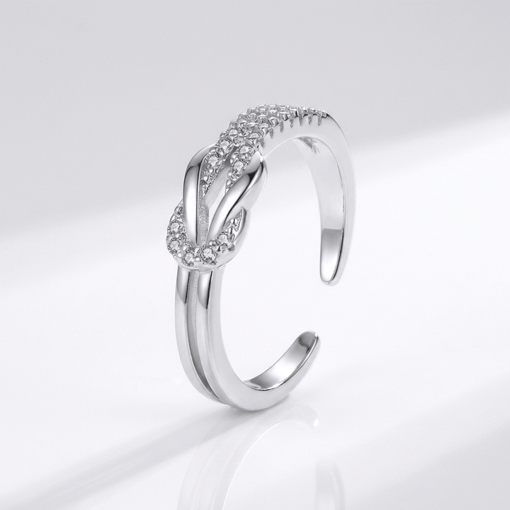 ANELLO AVVOLGENTE IN ZIRCONIA ARGENTATA - (REGOLABILE)