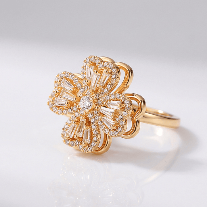 ANELLO A FIORE ROTANTE IN ZIRCONIA BAGUETTE - (REGOLABILE)