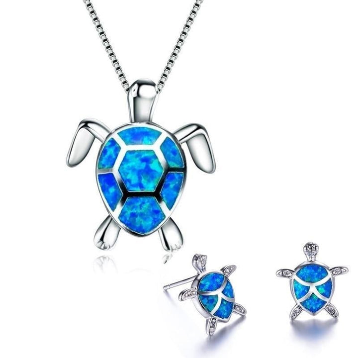 Collana e Orecchini a Forma di Tartaruga Marina in Opale e color argento