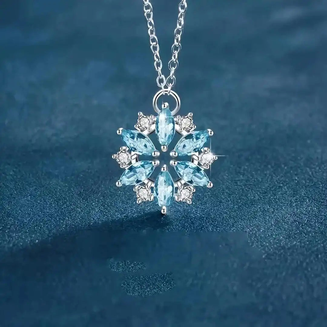 Ciondolo a Fiore di Neve Blu color oro Bianco