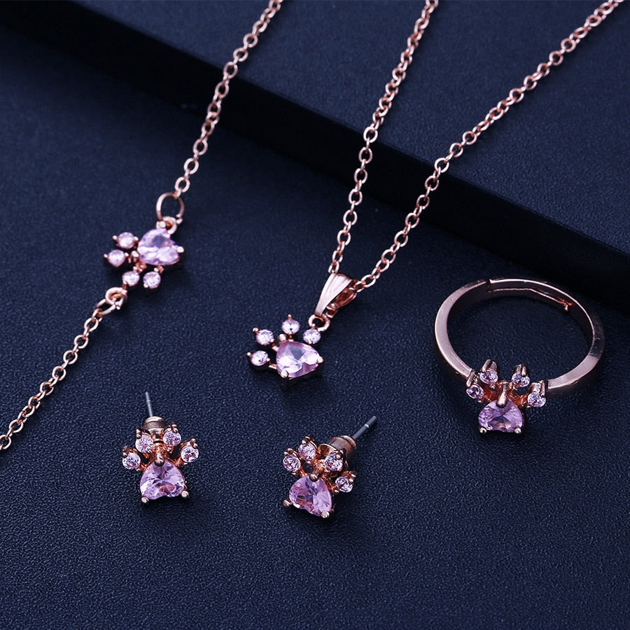 Set di Gioielli con Zampa color oro Rosa – 4 Pezzi con Cuore in Zirconia (Anello, Collana, Orecchini, Bracciale)